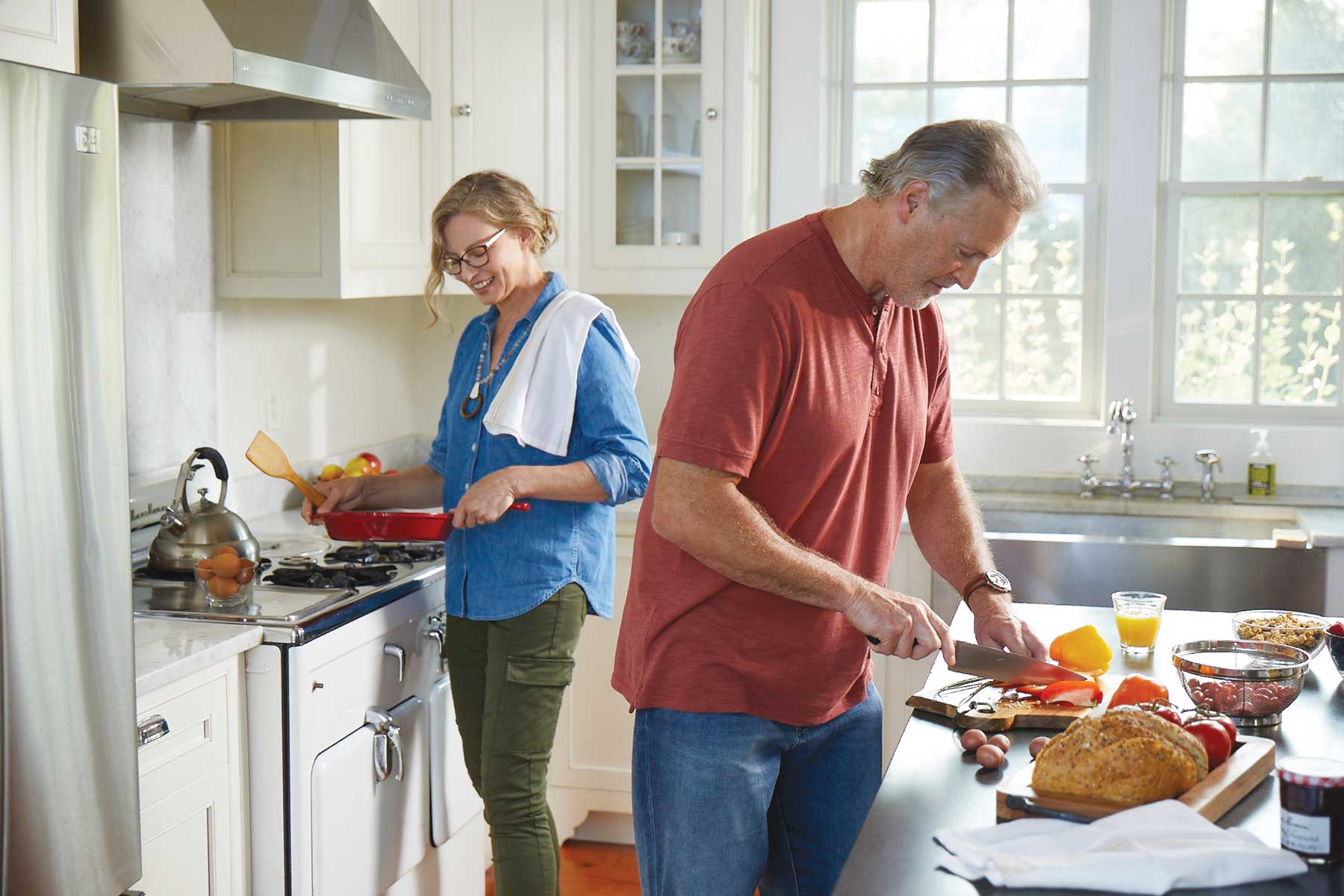 couple cooking in kitchen